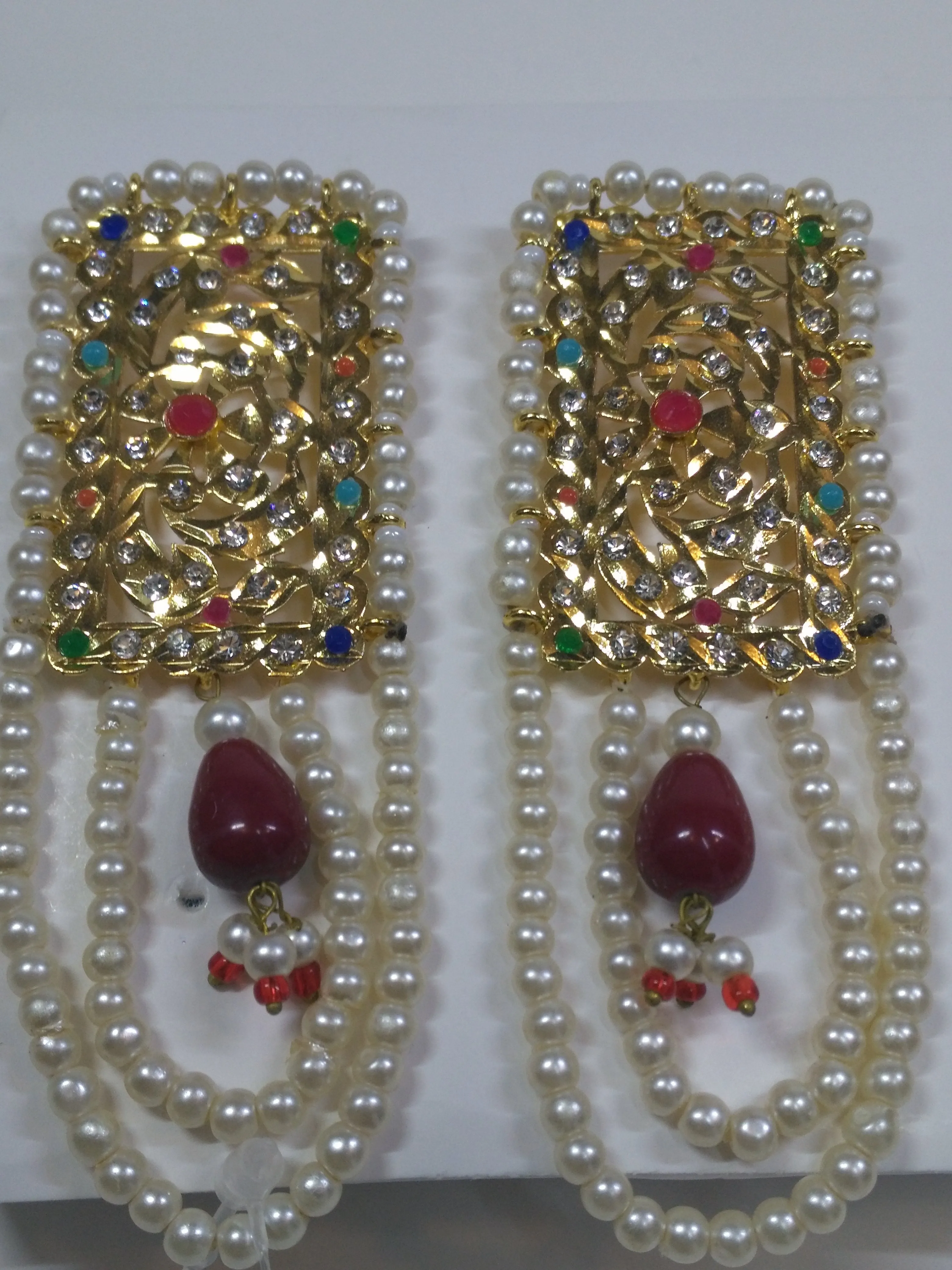 Golden base Hyderabadi earrings with modern choker